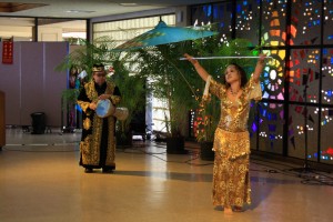 (L to R) Tamima Yee-Custodio and Arik Custodio dance for MEDAH (Middle Eastern Dance Artists of Hawaii)