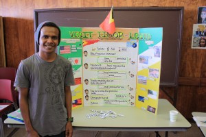 Timor booth, run by exchange student Leonardo de Sousa Rosa, teaching students useful travel phrases in Portuguese.