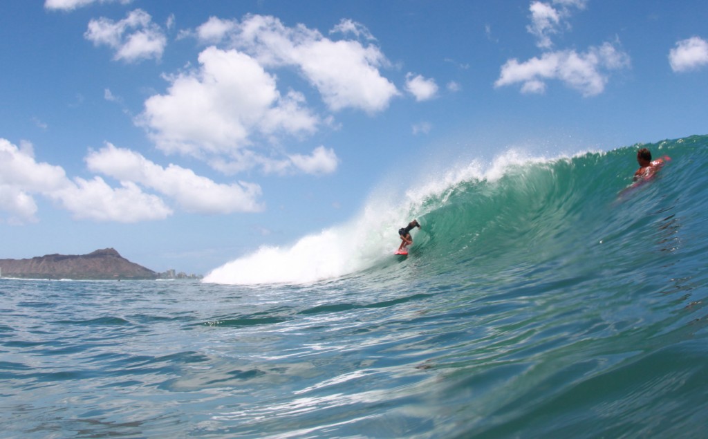 Flynn Novak finds the pocket on a wave at Ala Moana Bowls during a south shore swell