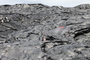 The current lava flow is coming from Puʻu Ō'ō. The flow is visible from Hawaiʻi Volcanoes National Park.