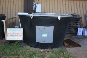 An earth tub is a forced air composting system that is churned by an auger twice daily to create zero pathogen laced fertilizer.  