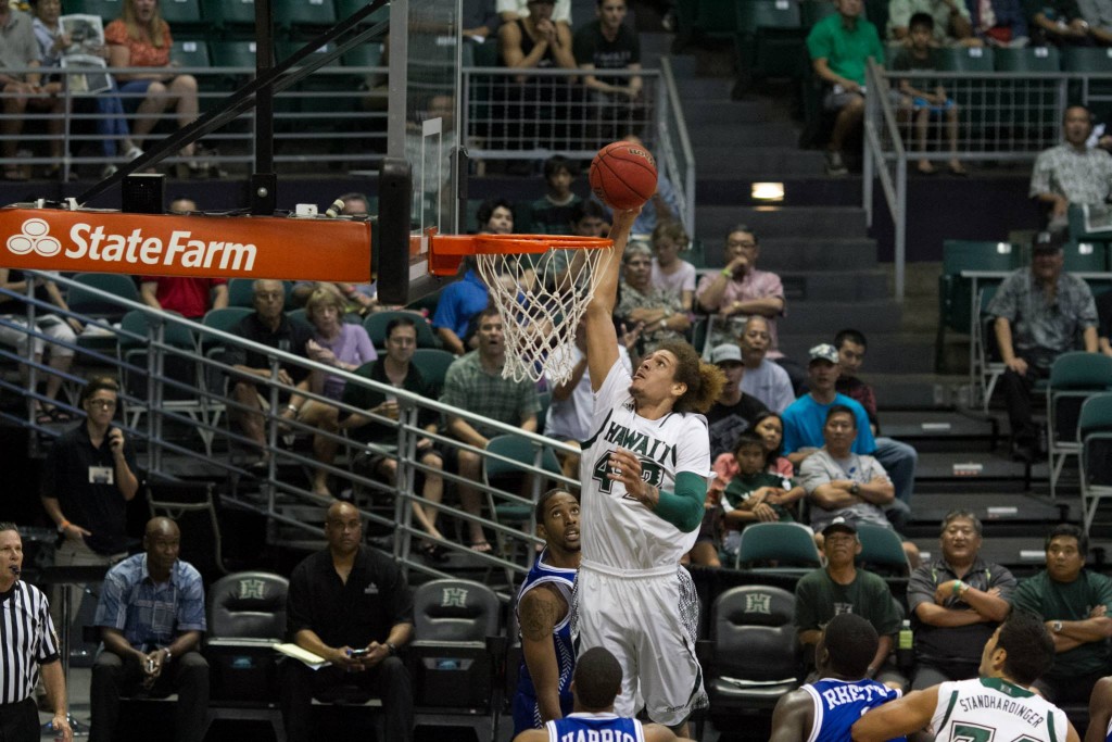 Isaac Fotu goes for a dunk when the Rainbow Warrior Basketball team hosted the Tennessee State Tigers. Photo: Devin Takahashi/Kapi'o.