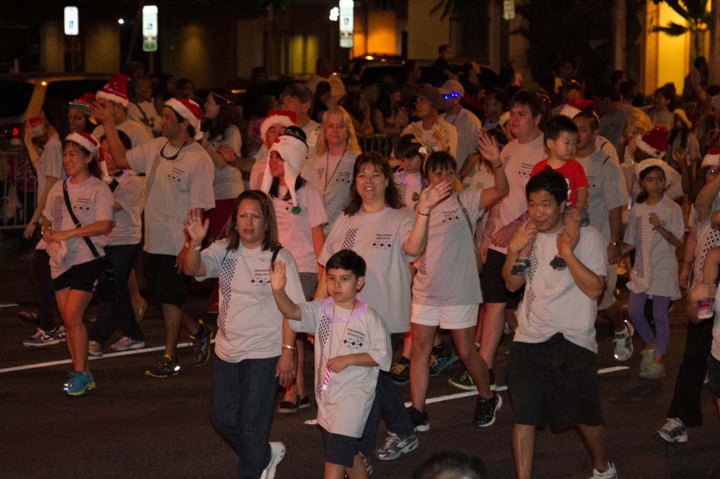 Some kids participating in the annual christmas parade in downtown Honolulu. Photo: Devin Takahashi/Kapiʻo.