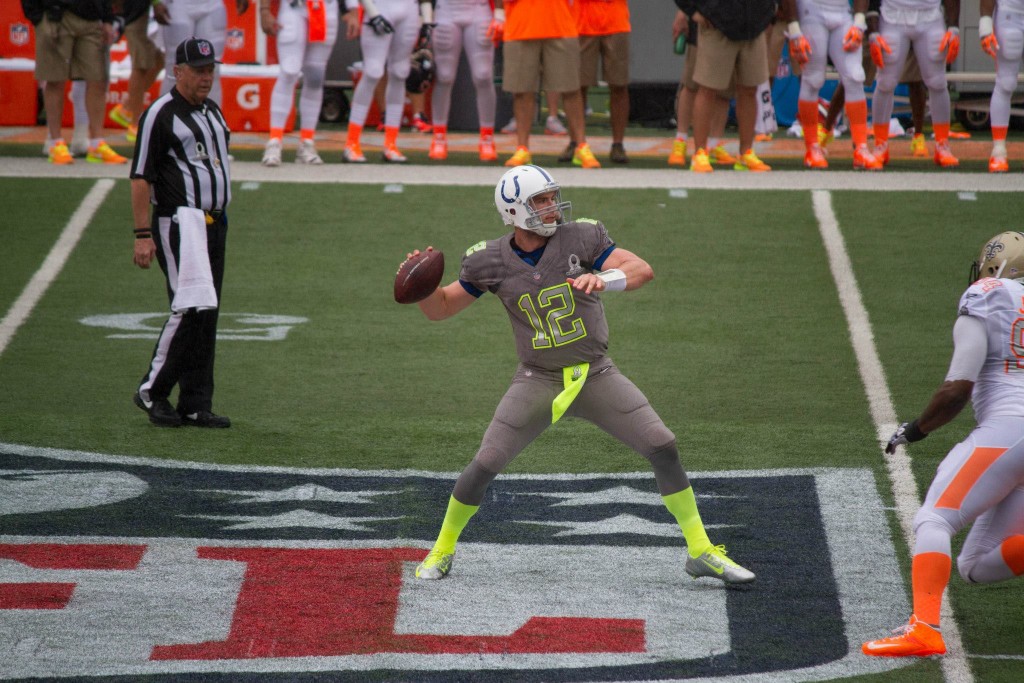 Andrew Luck looks deep for a receiver at the 2014 NFL Pro Bowl. Photo: Devin Takahashi/Kapiʻo.